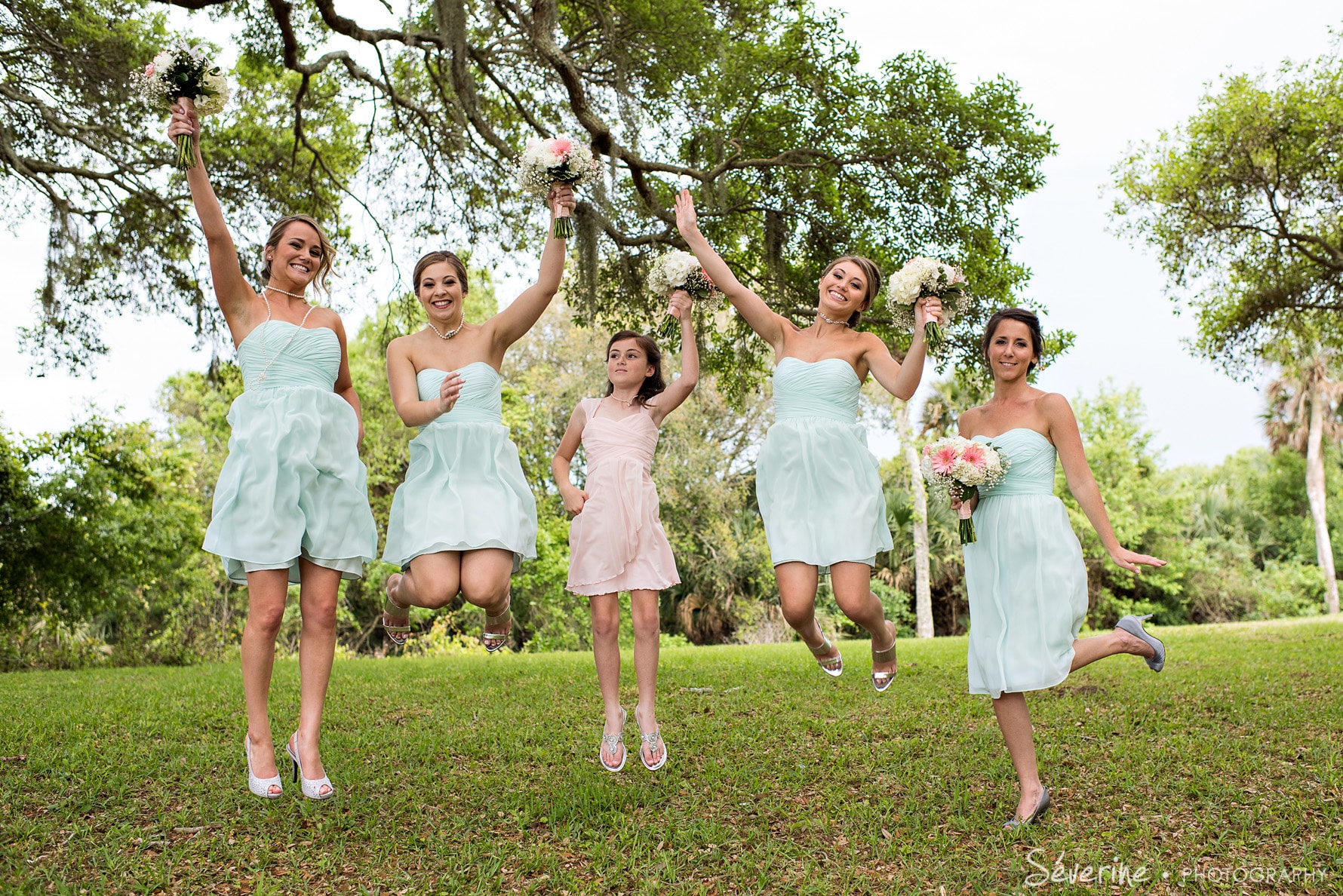 jumping teal bridal party