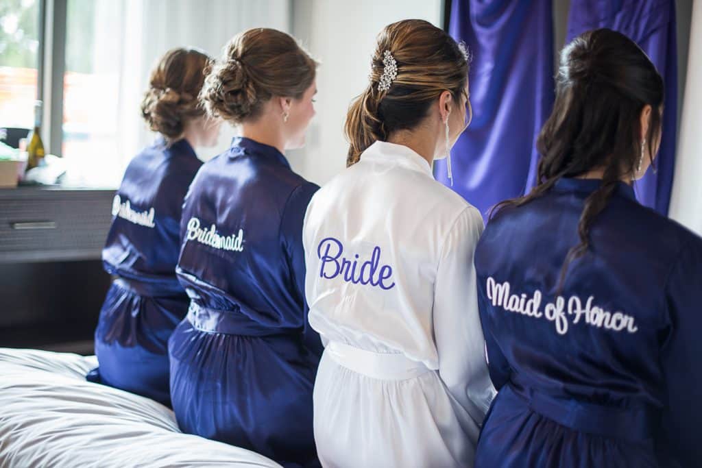 bride and bridesmaids in blue